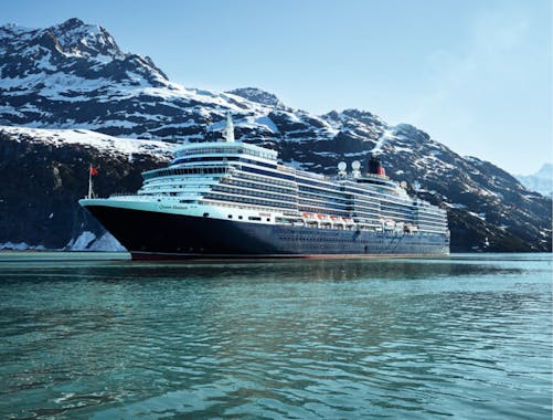 Cruise ship with mountains in background