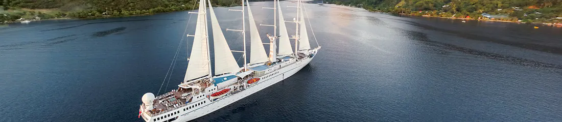 Cruise ship with mountains in background