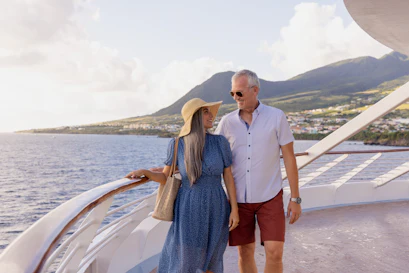Couple walking on deck of a Windstar ship