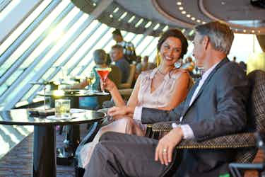 couple in horizons bar on oceania ship