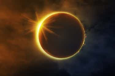 solar eclipse in dark sky