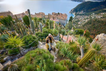 couple walking in eze, france