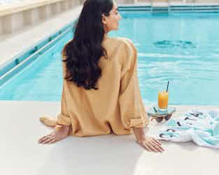 woman by pool on crystal ship