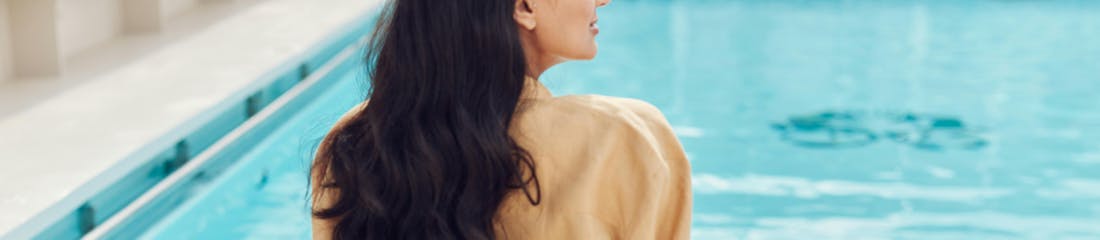 woman by pool on crystal ship