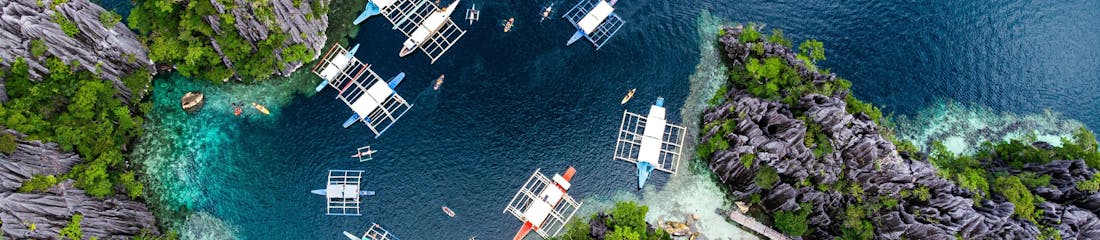 boats in el nido bay, phillipines