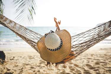 woman in hammock on the beach