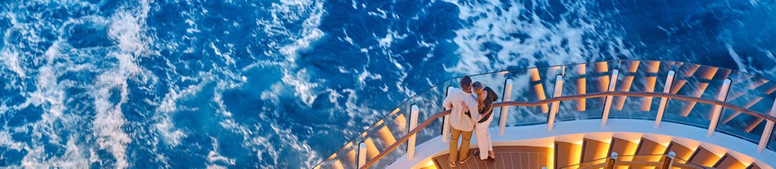 couple on stairs of silver ray ship - silversea