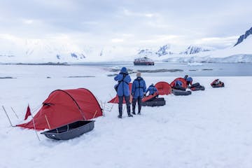 people camping at damoy point in antarctica with hx expeditions