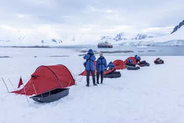 people camping at damoy point in antarctica with hx expeditions