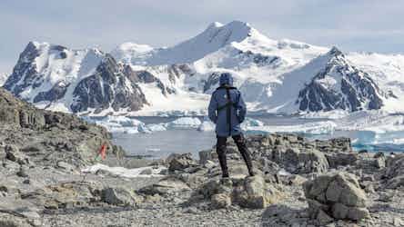 person standing looking at view in antarctica with HX