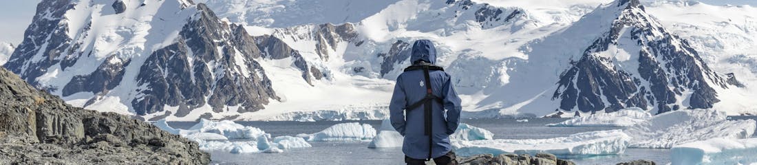 person standing looking at view in antarctica with HX