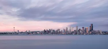 City skyline viewed from across a harbour