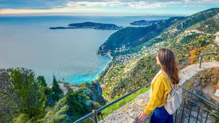 woman overlooking ocean in eze, france - windstar