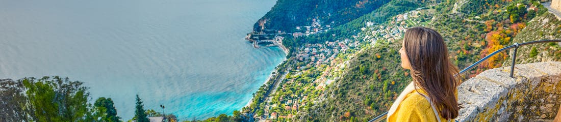 woman overlooking ocean in eze, france - windstar