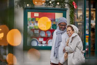 couple at christmas market in vienna - uniworld