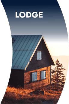 A log cabin sits in front a calm lake with an evergreen at the front porch. The word 'Lodge' is atop of the image and its borders shape like a wind-filled sail curving to the right